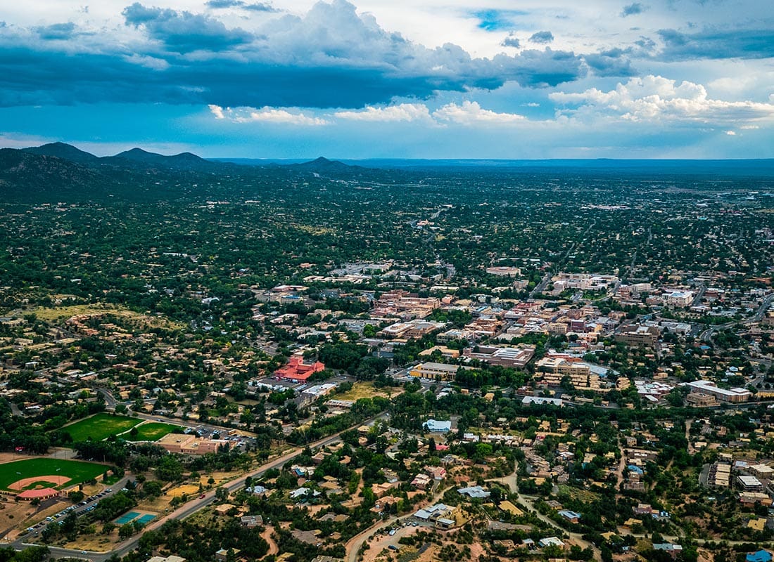 Roswell, NM - Aerial View of Roswell, NM With Mountain Ranges in the Background